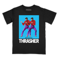 A black short-sleeve graphic t-shirt featuring a large front print of Brandon Flowersn in red shirts and purple pants against a bright blue background, with the word 'THRASHER' in bold white letters below.