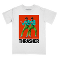 A white short-sleeve crewneck t-shirt featuring a graphic print of Brandon Flowers in bright green outfits against a red-orange background, with the word 'THRASHER' printed in bold black letters below.