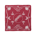 A square red bandana featuring a white desert-themed graphic print with the words 'Brandon Flowers' in a central circle, surrounded by moons, cactus silhouettes, stars, and a rope border.